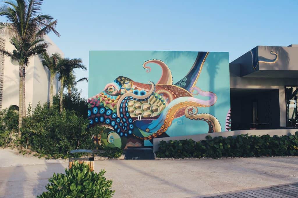 living in playa del carmen street art